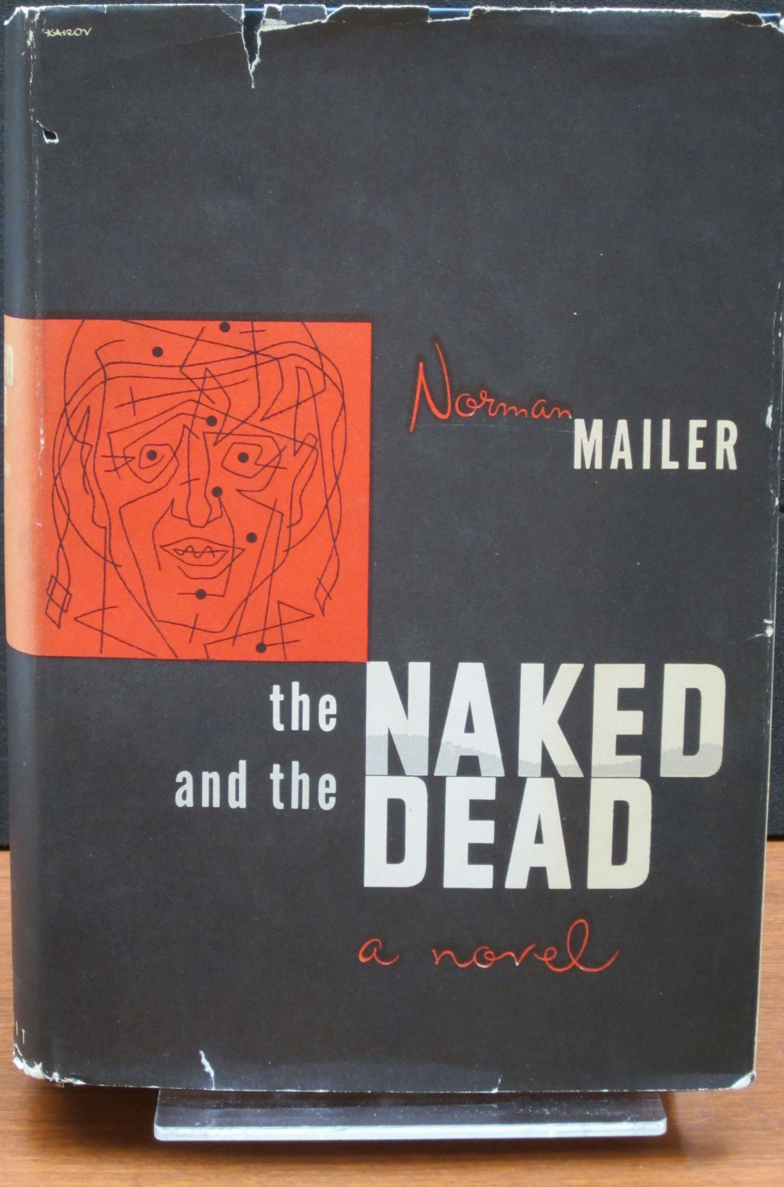 Cover of Norman Mailer's The Naked and the Dead, 1948.  The jacket design is by Karov. (PS 3525 .A4152 N3. Photograph by Petrina Jackson.)