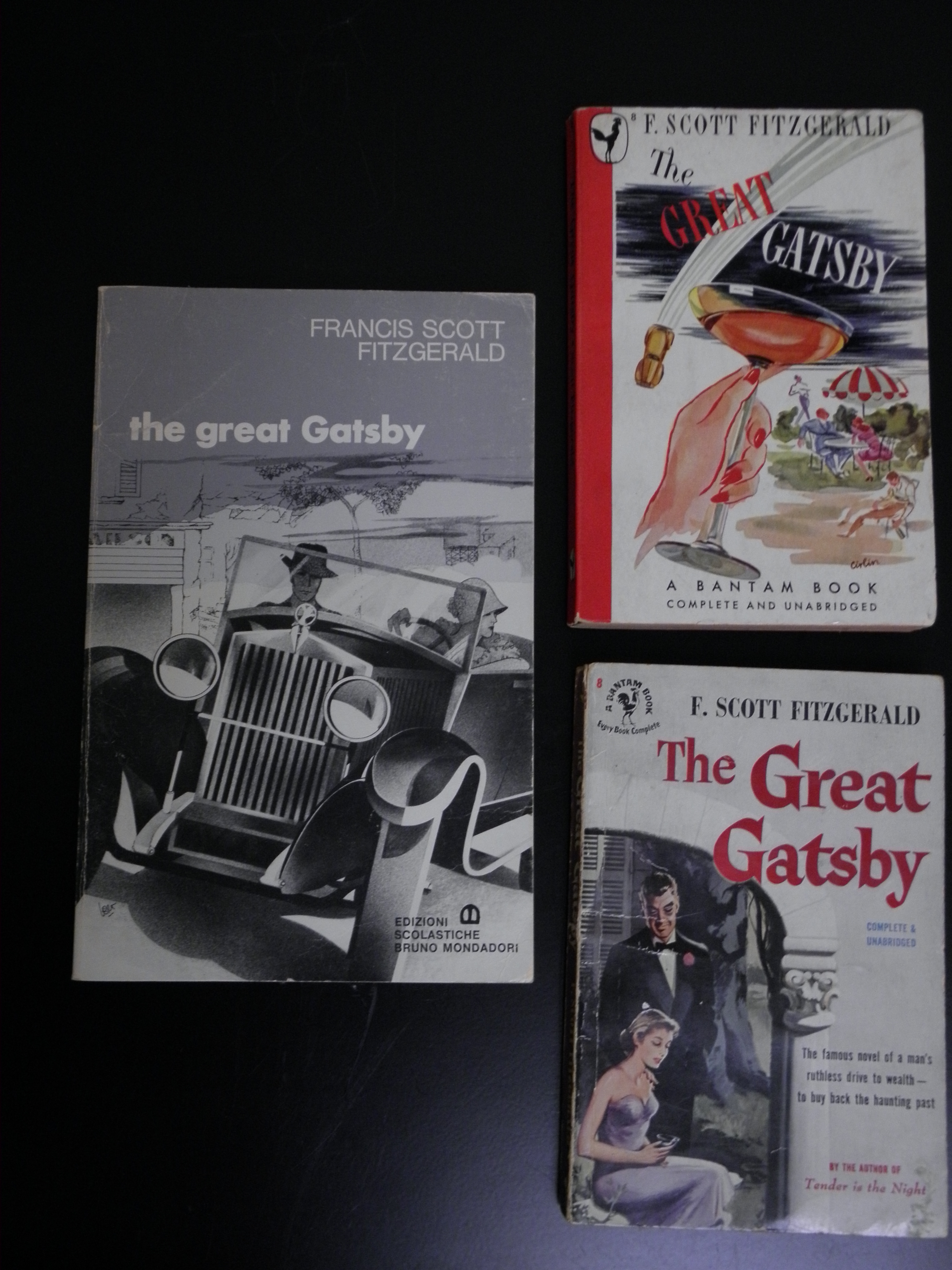 Various paperback editions of The Great Gatsby (clockwise, English language, Italian printing: PS 3511 .I9G7 1977; with martini glass: PS3511 .I9G7 .1945; with girl in purple dress:   PS3511 .I967.  )