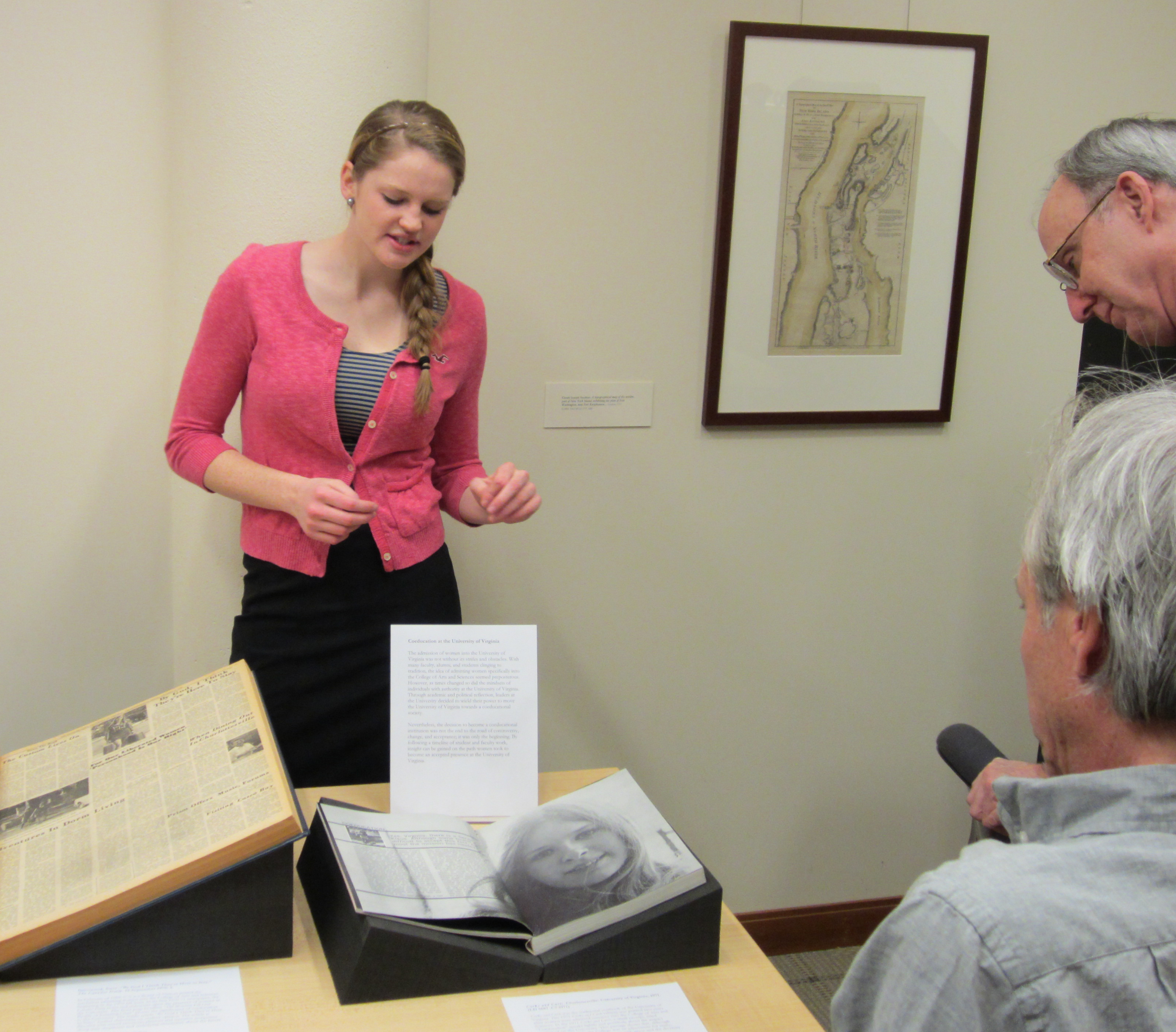 Bethany Ackerman discusses one of her exhibition items with Special Collections staff, November 26, 2013. (Photograph by Petrina Jackson)