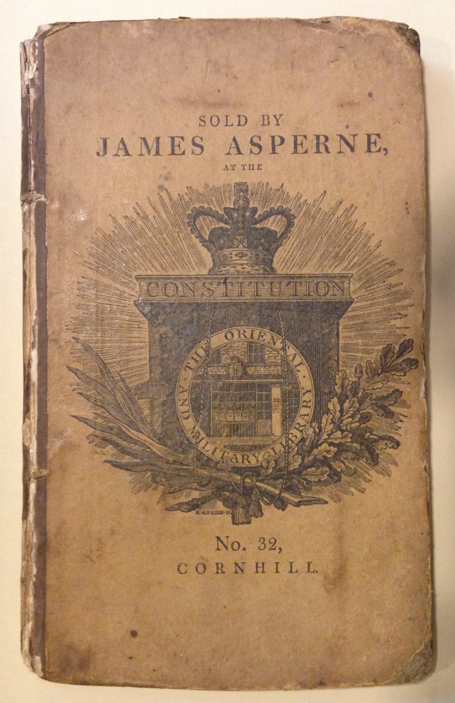 An unusual London bookseller's retail binding, ca. 1806, on a copy of Robert Bloomfield's Wild flowers; or, pastoral and local poetry (London: Printed for Vernor, Hood, and Sharpe, and Longman, Hurst, Rees, and Orme, 1806). The front board consists of a printed advertisement for bookseller James Asperne; the binding also bears Asperne's bookseller's label on the rear pastedown.     (PR 4149 .B6 W5 1806)