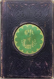 Cover of a book entitled "Gift of Love" with gold text set against a bright green circle.