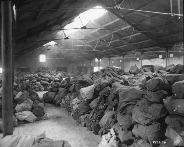 Warehouse with hundreds of bags of mail.