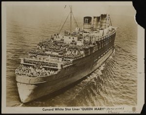 Postcard featuring Cunard White Star Liner "Queen Mary" at sea.