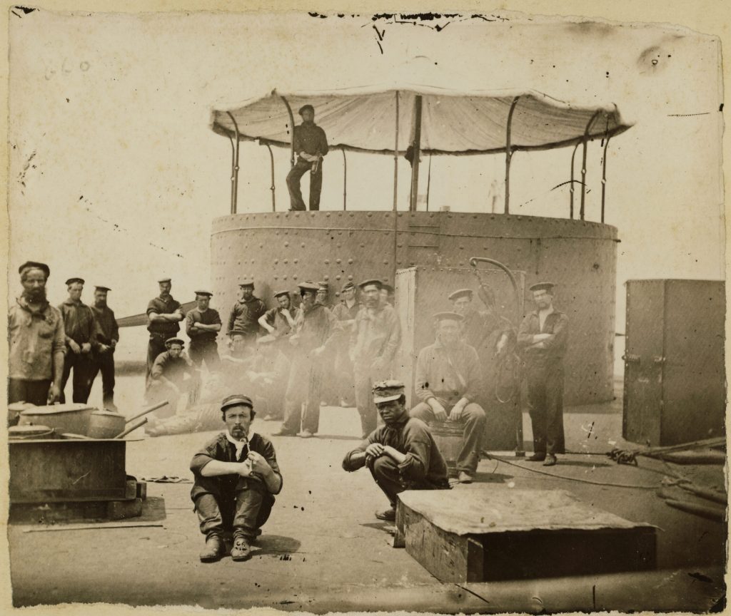 Black-and-white photograph of a crew on a ship